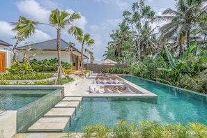 Outdoor pool, pool umbrellas, pool loungers