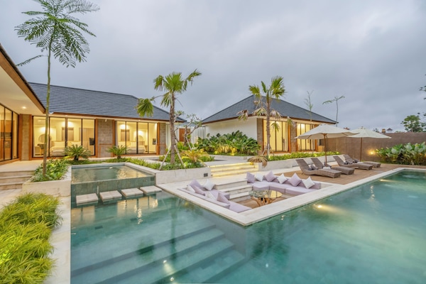 Outdoor pool, pool umbrellas, sun loungers