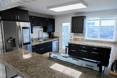 Fridge, microwave, oven, stovetop. Cozy home with a pool, hot tub & steam shower
