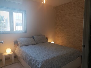 2 dormitorios, tabla de planchar con plancha, wifi gratis y ropa de cama