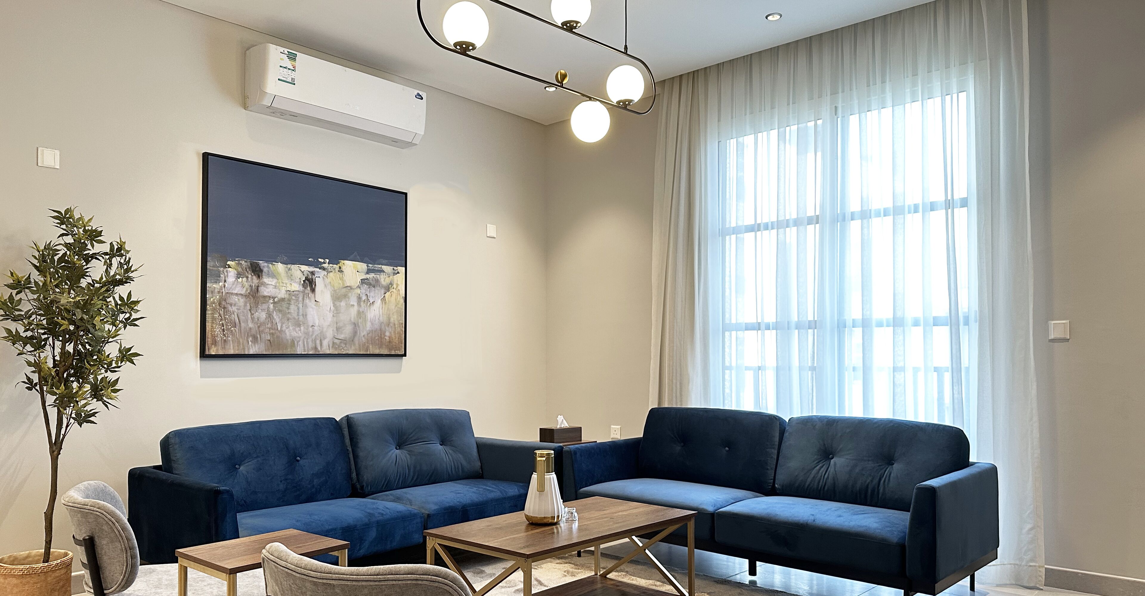 Design Apartment, 3 Bedrooms | Living area | Flat-screen TV