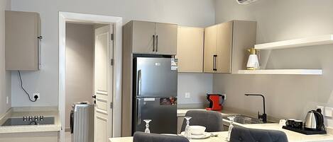 Design Apartment, 3 Bedrooms | Private kitchen | Electric kettle