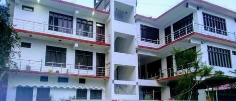 Guest house with modern design and balconies.