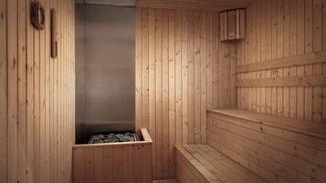 A wooden sauna with benches and a steam room.