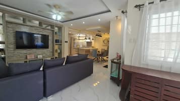 Standard House, 4 Bedrooms, Kitchen, Mountain View | Living room | 65-inch Smart TV with digital channels