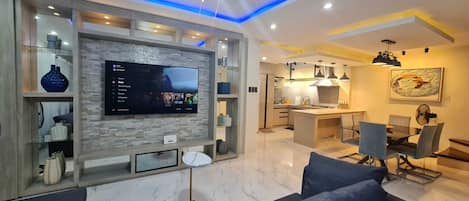 Standard House, 4 Bedrooms, Kitchen, Mountain View | Living room | 65-inch Smart TV with digital channels