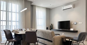 Design Apartment, 3 Bedrooms | Living area | Flat-screen TV - Kease Hittin V-7 Royal Design AX80 (Riyadh)