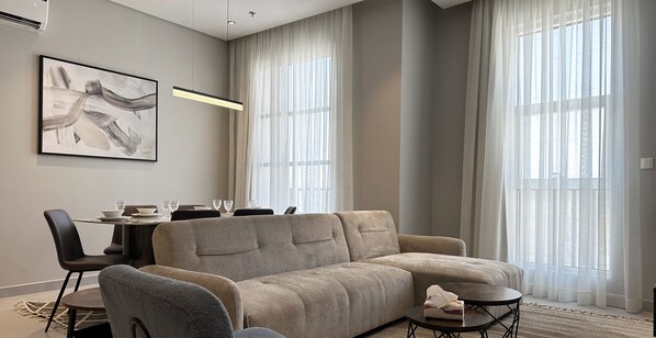 Design Apartment, 3 Bedrooms | Living area | Flat-screen TV - Kease Hittin V-7 Royal Design AX80 (Riyadh)