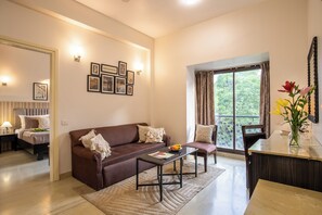 City Apartment, 2 Bedrooms, City View | Living area | 43-inch LCD TV with cable channels - BedChambers Serviced Apartments Sector40 (Gurugram)