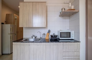 Premium Apartment, City View | Private kitchen | Fridge, microwave, toaster, cookware/dishes/utensils - BedChambers Serviced Apartments Sector40 (Gurugram)