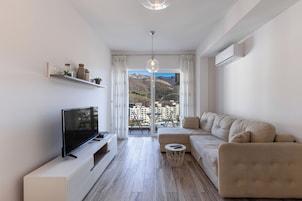 Apartamento, 1 habitación | Zona de estar | Una Smart TV