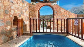 A stone-walled pool area with a wooden gate and a 'No Diving' sign. - Elounda Monastiri Cretan sea View House With Pool (Agios Nikolaos)