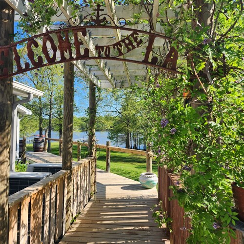 Beautiful view from deck, Private Dock, Firepit, Golf Cart-items to the water.