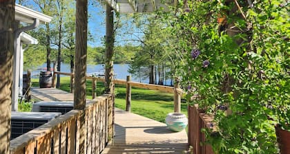 Beautiful view from deck, Private Dock, Firepit, Golf Cart-items to the water.
