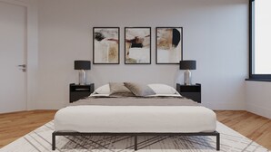 A modern bedroom with a large bed, two bedside tables with lamps, and three abstract paintings on the wall. - Cozy 2BR Apt in Arlington, VA. Minutes from  Washington D.C. (Arlington)