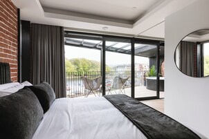 Deluxe-Suite, Meerblick | 1 Schlafzimmer, Pillowtop-Betten, Zimmersafe, Verdunkelungsvorhänge