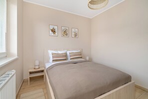 Apartment, 1 Schlafzimmer, Küche | 1 Schlafzimmer, Bettwäsche