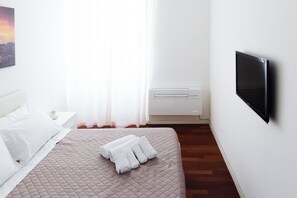 1 habitación, tabla de planchar con plancha, wifi y ropa de cama 