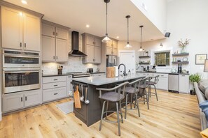 Fridge, microwave, oven, stovetop - Loch Nest on Lake Gaston | Hot Tub • Sauna • Game Room • Boathouse (Boydton)