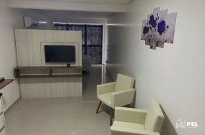 City Apartment | Living area | TV
