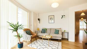 Apartment (2 Bedrooms) | Living area | 37-inch Smart TV with cable channels