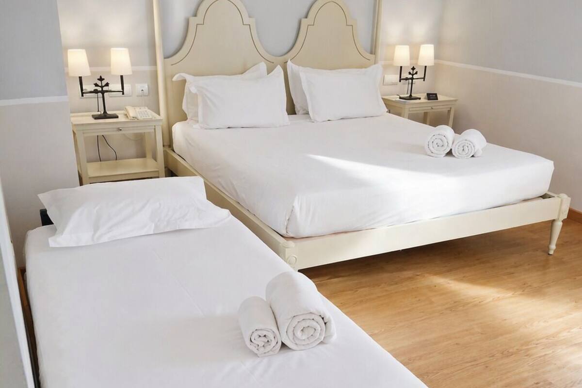 Room, Multiple Beds | Minibar, desk, soundproofing, free WiFi