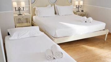 Chambre, plusieurs lits