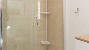 Shower, hair dryer, shampoo
