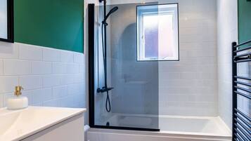 Hair dryer, towels, soap, shampoo