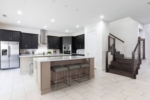 Fridge, microwave, oven, stovetop - Stunning and luxe Bears Den Luxury Villa w/ Outdoor Kitchen near Disney (Kissimmee)