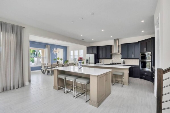 Fridge, microwave, oven, stovetop - Stunning and luxe Bears Den Luxury Villa w/ Outdoor Kitchen near Disney (Kissimmee)