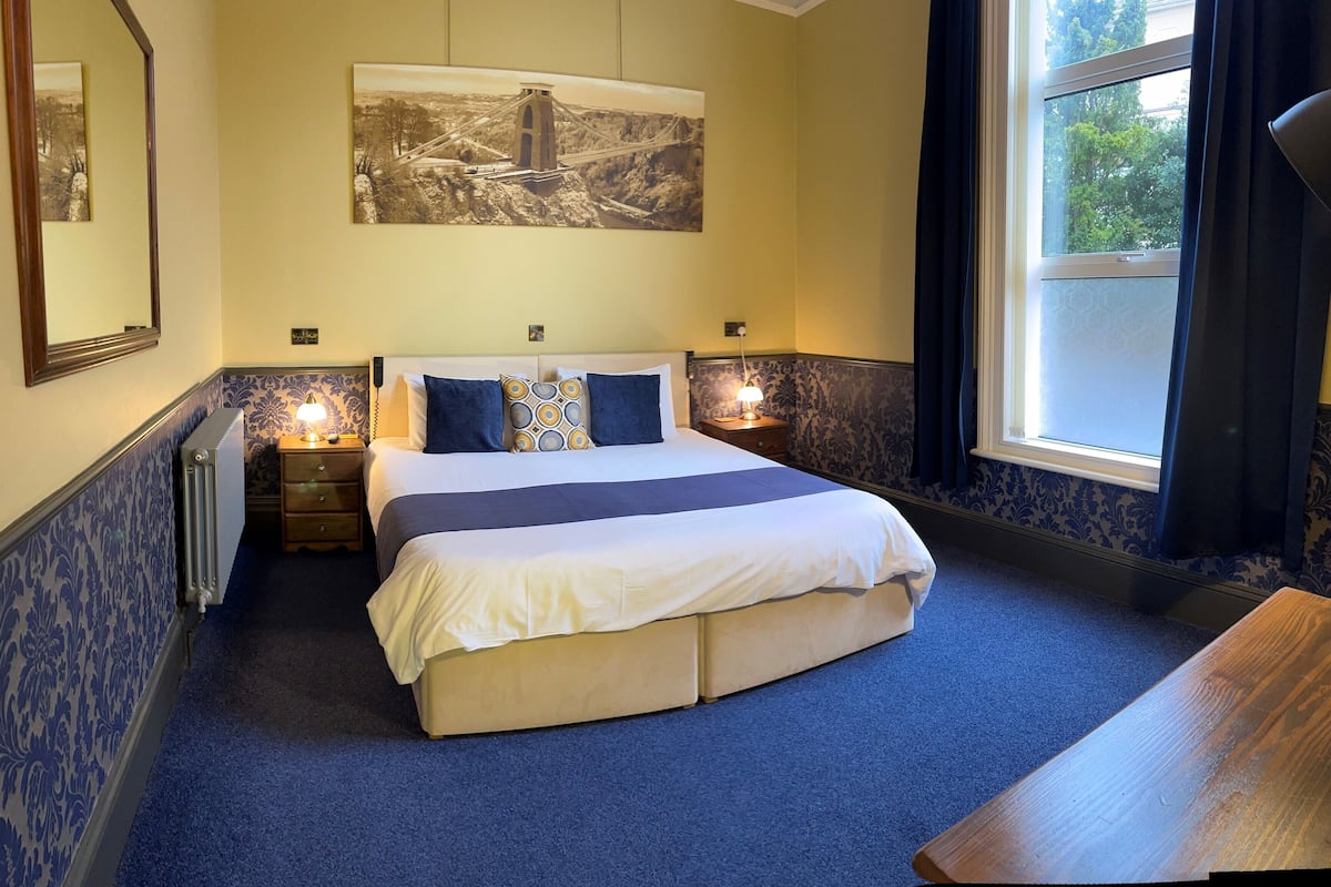 Deluxe Apartment, Pool View | In-room safe, laptop workspace, blackout curtains, iron/ironing board