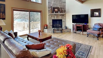 House (5 Bedrooms) | Living area | 50-inch flat-screen TV with digital channels, fireplace, table tennis