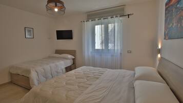 1 chambre, fer et planche à repasser, Wi-Fi gratuit, draps fournis