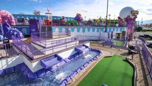A water play area with a pool, slides, and a ball pit. - 2 Bedroom Condo with River View | Located in Pigeon Forge | Sleeps 6 (Pigeon Forge)