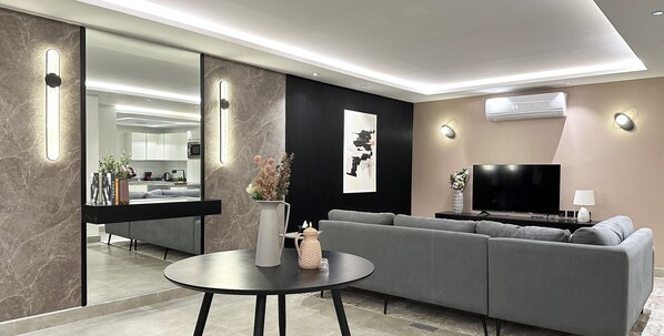 Design Apartment, 3 Bedrooms | Living area | Flat-screen TV - Kease Malqa 31-10 Luxury Gold AG23 (Riyadh)
