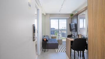 Apartamento | Área de estar | TV