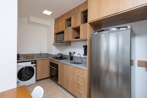 Apartamento | Cozinha privada | Geladeira