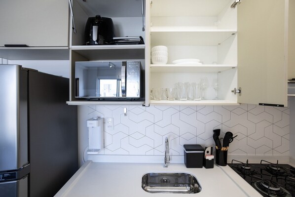 Apartamento | Cozinha privada | Geladeira