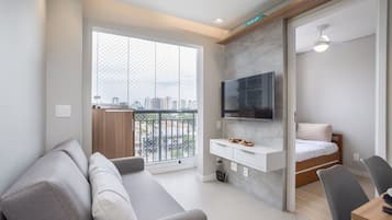 Apartamento básico | Área de estar | TV