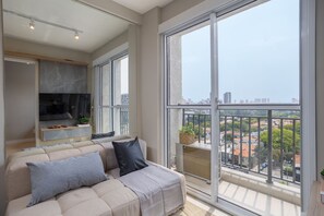 Apartamento básico | Área de estar | TV