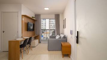 Apartamento | Área de estar | TV