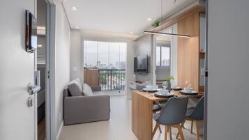 Apartamento | Área de estar | TV