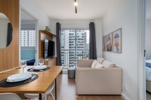 Basic Apartment | Living area | TV - Composite Moema (São Paulo)