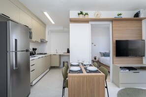 Apartamento | Cozinha privada | Geladeira