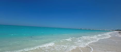 On the beach, sun-loungers, beach towels
