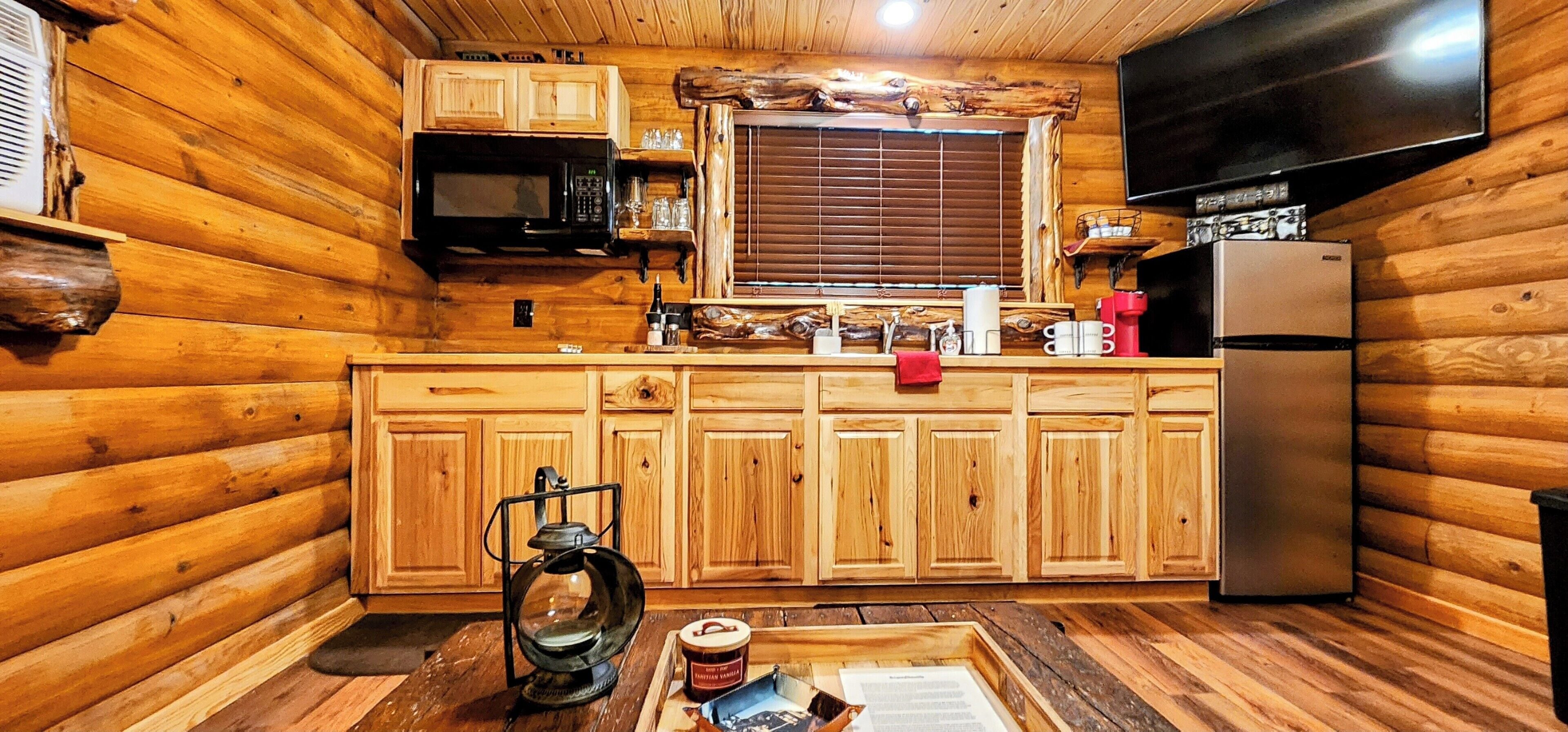 Fridge, microwave, stovetop, coffee/tea maker