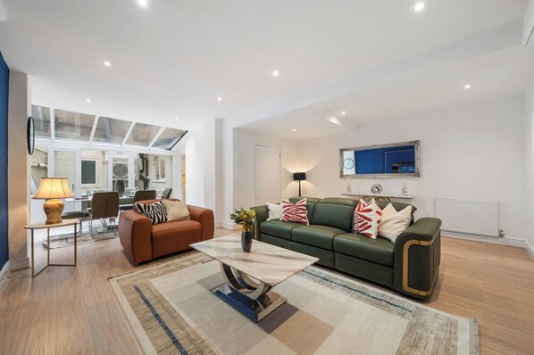 Deluxe Apartment, 2 Bedrooms | Living area | 40-inch Smart TV with digital channels - The Hertford Boutique (London)