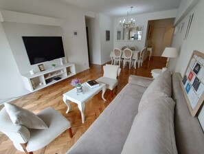 Family Apartment | Living area | Flat-screen TV