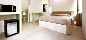 Kamar Double Standar | Minibar, brankas, meja kerja, dan Wi-Fi gratis